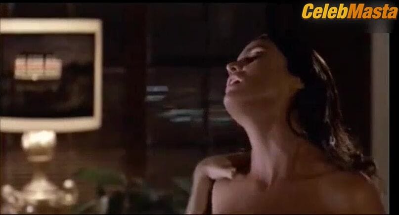 Tracy Scoggins nude/sexy scene in In Dangerous Company