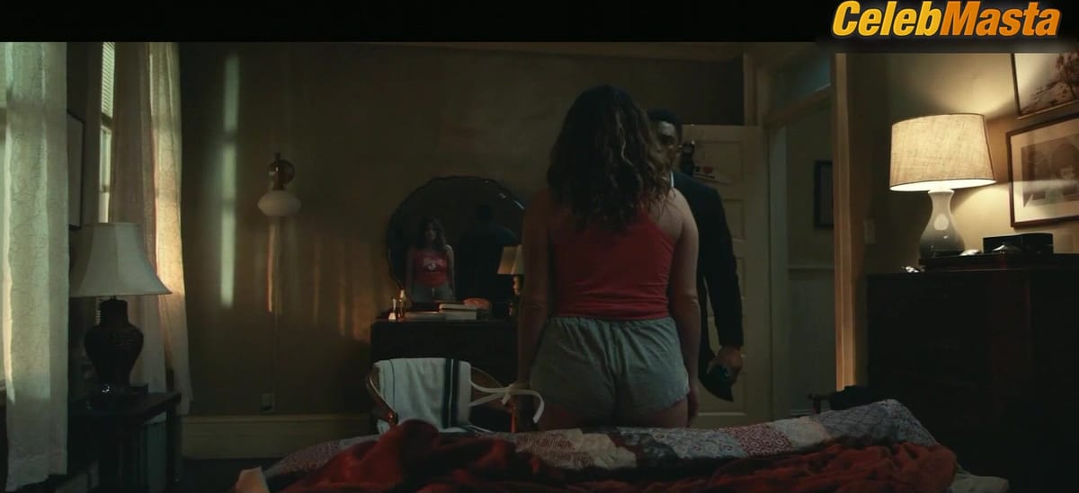 Jamie Neumann nude/sexy scene in 21 Bridges